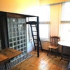 Photo 2: Bay window and shower.