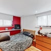 Photo 15: Bedroom 2 - desk / dressing table with illuminated mirrors, double bed, and ample storage