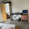 Photo 2: Picture shows the desk, chair and closet that comes with the room