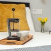 Photo 1: French Press On Bed