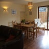 Photo 4: Dining area with patio doors