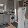Photo 2: Kitchen - Sink, Washing Machine, Dishwasher