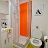 Photo 9: One of the Bathrooms