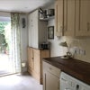 Photo 6: Kitchen with dishwasher, microwave and washing machine