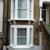 Photo 7: Front of Property