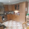 Photo 2: Kitchen with built-in oven, hob, fridge, dishwasher, standalone bar drawer freezer, 6 seater kitchen