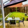 Photo 5: Patio & Back Garden with Canopy & outside dining.
