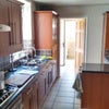 Photo 3: Kitchen and downstairs bathroom