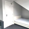 Photo 2: Attic bedroom
