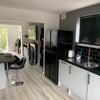 Photo 5: Open Plan Kitchen with Breakfast Bar