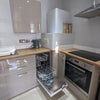 Photo 4: Dishwasher/oven