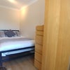 Photo 2: Modern laminated bedroom with double bed