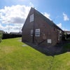 Photo 2: Photo of showing the side/back of house.