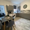 Photo 3: COMMUNAL KITCHEN