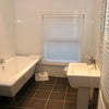 Photo 5: The bath/shower room