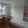 Photo 1: Single bed in double-sized room. (For guests, you can pull out the 2nd bed which is stored underneat