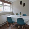 Photo 2: Sunny shared dining area