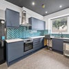 Photo 3: this is the 2nd floor kitchen, the ground floor kitchen is similar. 