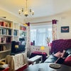 Photo 6: Shared living room - with brand new TV, sofa, bookshelves, coffee table, lamp and beautiful decor