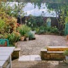 Photo 4: The Garden from outside the kitchen doors.