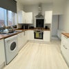 Photo 1: Communal kitchen