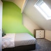 Photo 2: Spacious Double Bedroom