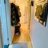Photo 8: Hallway w tons of coat hooks and shoe storage