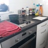 Photo 5: Compact kitchen with new built in cooker