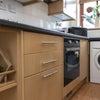Photo 1: Washing machine and tumble dryer