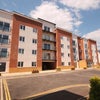 Photo 2: Apartment Building