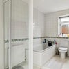 Photo 4: 2 huge bathrooms with bath and shower