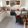 Photo 6: Shared kitchen with full cooking & laundry facilities