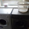Photo 9: Utility room - washing machine and clothes dryer