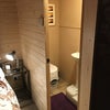 Photo 4: En-suite portable toilet and sink