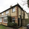 Photo 1: Front of property