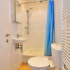 Photo 7: Bathroom with shower
