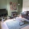 Photo 4: Spacious lounge tastefully decorated