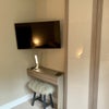Photo 5: Wall mounted TV and Desk Area