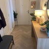 Photo 4: Hallway to front door (bathroom door on the right