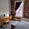 Photo 1: Bedroom and desk