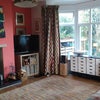 Photo 5: Cosy sitting room