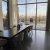 Photo 6: Shared work space available on the ground floor of the building and coffee area
