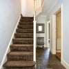 Photo 5: Stairs to tof floor bedrooms