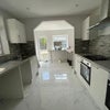 Photo 2: COMMUNAL KITCHEN