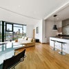 Photo 2: lounge + open plan kitchen