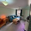 Photo 6: Large front room with dining/work area and seating for tv/movie nights.