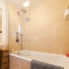 Photo 4: Bathroom with dual shower fittings