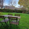Photo 3: Communal garden with a private table and chairs