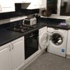 Photo 6: Kitchen includes 9kg washing machine.