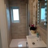 Photo 7: bathroom with power shower, all new